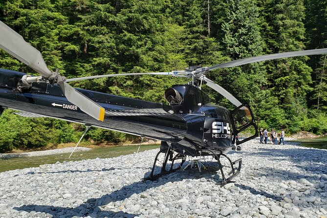 Coast Mountain Landing Helicopter Tours (Depart SKY Hangar) - Seeing a population of three million give way to wilderness