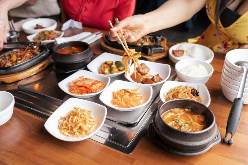 Downtown Vancouver: Asian Eats Walking Food Tour - Learning the customs behind the food