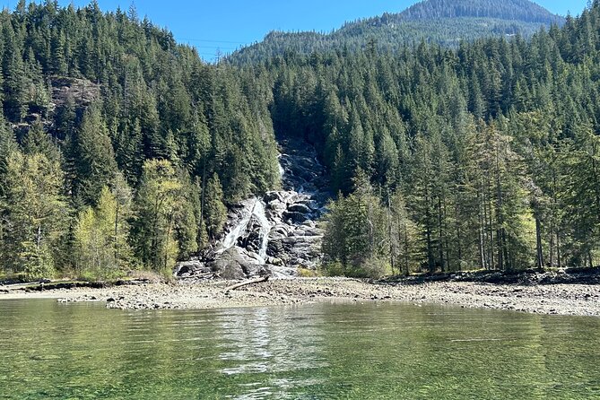 Granite and Silver Falls Private Boat Tour in Vancouver - Historic powerhouses seen from the boat