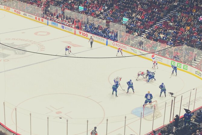 Vancouver Canucks Ice Hockey Game Ticket at Rogers Arena - Food, drinks, and merchandise inside the arena