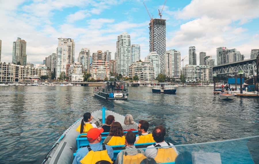 Vancouver: City and Seal Boat Tour - Under the Lions Gate Bridge