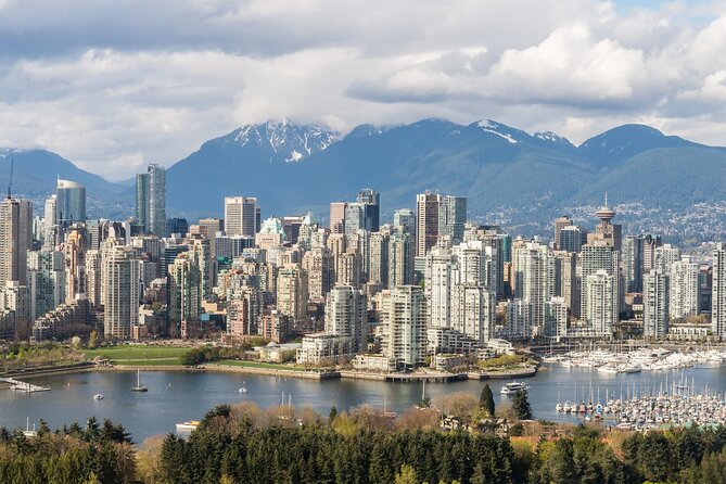 Vancouver City Tour with Admission to Lookout Tower - Stanley Park, totem poles, and the Seawall