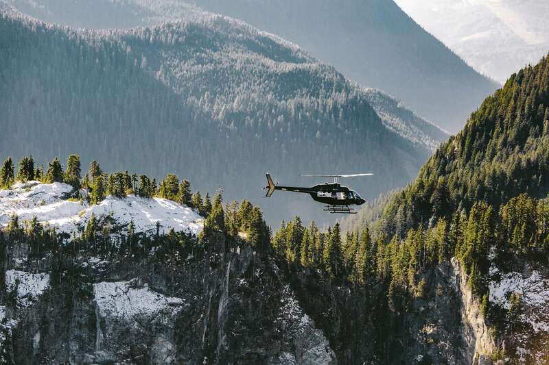 Vancouver: Coastal Mountain Landing Helicopter Tour - Widgeon Lake, cliffs, and a waterfall