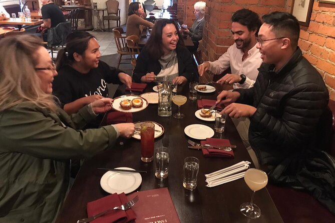 Vancouver Food Tour with 6 Tastings of Sushi, Chocolate, and more - The Olympic torch and a waterfront pause