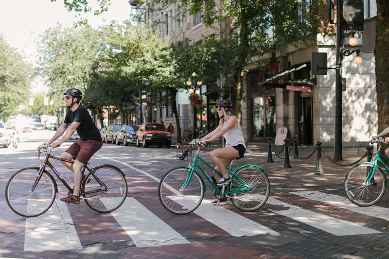 Vancouver: Half-Day City Highlights E-Bike Tour Age 16+ - Yaletown and Olympic Village show modern Vancouver