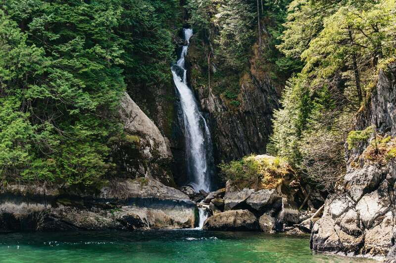 Vancouver: Indian Arm and Granite Falls Zodiac Boat Tour - Under the Lion’s Gate Bridge