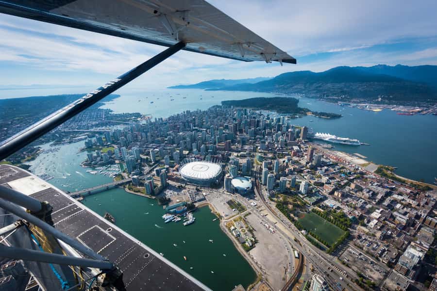 Vancouver to Victoria Seaplane Day Trip + Butchart Gardens - Vancouver to Victoria above Stanley Park and Burrard Inlet